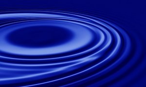 A blue circle with water rippling around it.