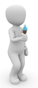 A person with an ice cream cone in their hand.